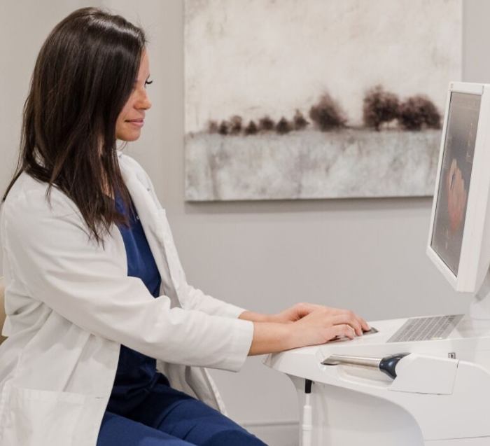 Grove City dentist looking at digital bite impressions on computer screen